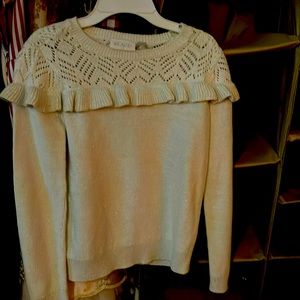 I’m selling this white sweater